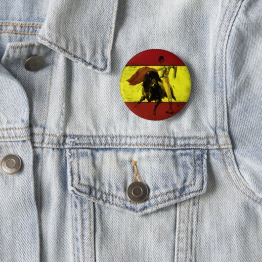 Knopf mit Bullfight auf schmutziger spanischer Button (Beispiel)