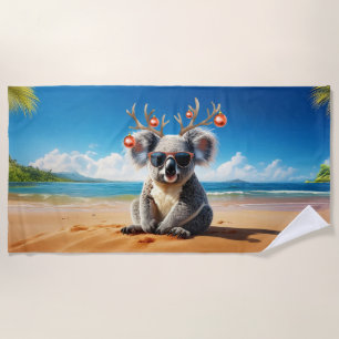 Koala am Strand mit Geweih und Schmuck Strandtuch