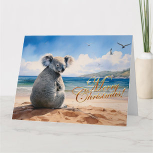 Koala an einem sandigen Strand Frohe Weihnachten Karte
