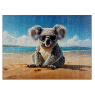 Koala an einem sandigen Strand Schneidebrett