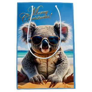 Koala an einem Sandstrand Frohe Weihnachten Mittlere Geschenktüte