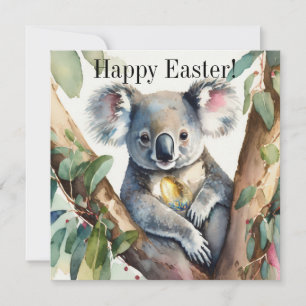 Koala-Bär, der ein goldenes Ostereier hält Karte