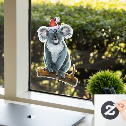 Koala-Bär in einer Weihnachtsmannmütze Fensteraufkleber (Büro)