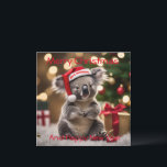 "Koala Kris Kringle: Christmas Down Under"<br><div class="desc">Dieses Bild bringt eine festliche australische Drehung,  mit der Koala in einer Weihnachtsmannmütze inmitten von Weihnachtsgeschenken und einem sanften Buschglühen.</div>