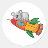 Koala schlafen bei einer farbenfrohen Rakete Runder Aufkleber (Vorderseite)
