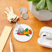 Koala schlafen bei einer farbenfrohen Rakete Schlüsselanhänger