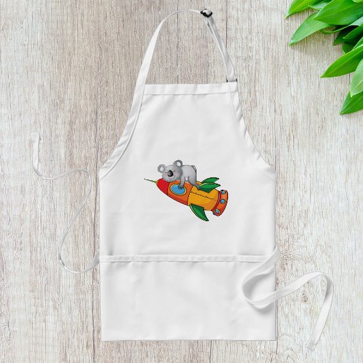 Koala schlafen bei einer farbenfrohen Rakete Schürze