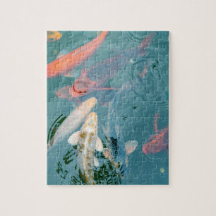 Koi-Fische schwimmen im Teich Puzzle