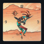 Kokopelli Square Wall Clock Quadratische Wanduhr<br><div class="desc">Dies ist eine einzigartige "Eine von einer Art" Südwesten Kokopelli Square Wall Uhr! Es besitzt ein Kokopelli in Türkis,  Orange und Schwarz Playing the Flute und Tanzen Unter der Sonne in der Wüste! Original Art Design von Künstler Kerry Miller.</div>