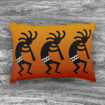 Kokopelli-Tanz im Südwesten von Orange und Schwarz