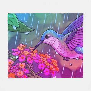 Kolibri trinkt Nektar aus Lantana-Blüten i Fleecedecke