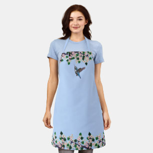 Kolibri und weiße Blumen auf hellblau Schürze