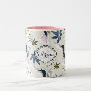 Kolibris und weiße Blumen. Zweifarbige Tasse