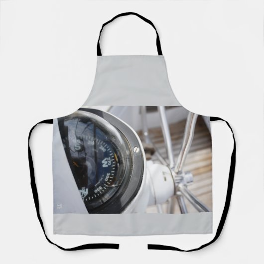 Kompas dat de richting geeft aan een avontuur.  schürze (Vorderseite)