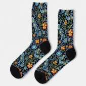 Komplexe Blumenkunst: Blaue und orangefarbene Blum Socken (Linkes Detail)