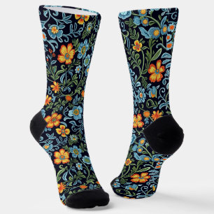 Komplexe Blumenkunst: Blaue und orangefarbene Blum Socken