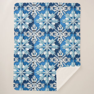 Komplexes blaues Schneeflocken-Design  Sherpadecke