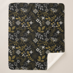 Komplexes florales Muster mit Gold und Weiß  Sherpadecke