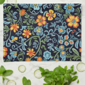 Komplizierte Blumenkunst: Blaue und orangefarbene  Geschirrtuch (Gefaltet)