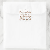 können Spuren von Nüssen enthalten Quadratischer Aufkleber (Tasche)