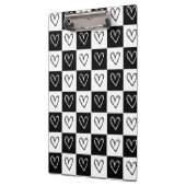 Kopfhörer an der Tafel Klemmbrett (Links)