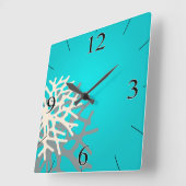 Koralle auf dem Elfenbein des blauen Graus des Quadratische Wanduhr (Winkel)