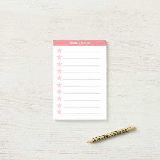 Korallenrosa Sterne Post-it Klebezettel (Auf Schreibtisch)