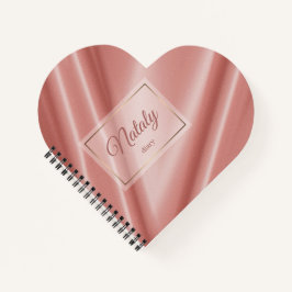 Korallenseidenstruktur. Goldener Rahmen. Notizbuch