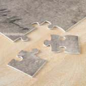 Körper eines Mannes, der einen Schädel hält (von A Puzzle (Seite)