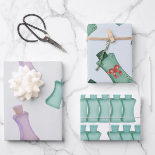 Kosmetikflaschen in grünen Farben mit Bogen Geschenkpapier Set