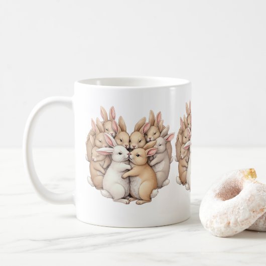 Kostbare Bunnies in einer gemütlichen, pastellfarb Kaffeetasse (Mit Donut)