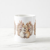 Kostbare Bunnies in einer gemütlichen, pastellfarb Kaffeetasse (Mittel)