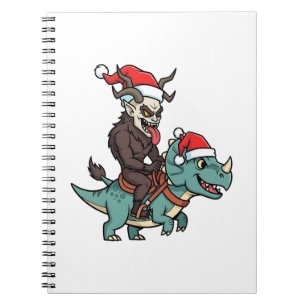 Krampus reitet auf einem Dinosaurier-Santa-Weihnac Notizblock