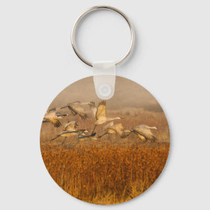 Krane über einem goldenen Feld Schlüsselanhänger