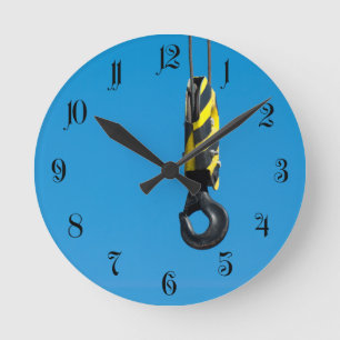 Kranhaken mit gelben und schwarzen Streifen Runde Wanduhr