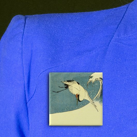 Kranich in Meereswelle Button