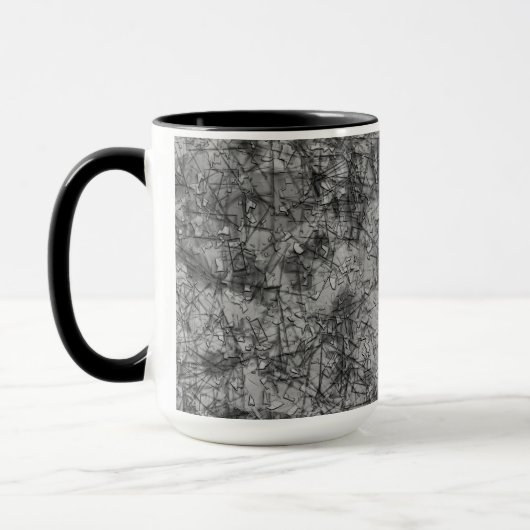 Kratzer auf einem leicht gepunkteten Grau Tasse (Links)