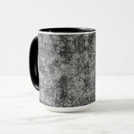 Kratzer auf einem leicht gepunkteten Grau Tasse