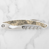 Kratzer auf einem leicht gepunkteten Khaki Kellnermesser (Vorderseite)