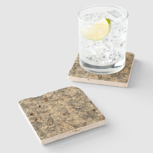 Kratzer auf einem leicht gepunkteten Khaki Steinuntersetzer (Seitenansicht)