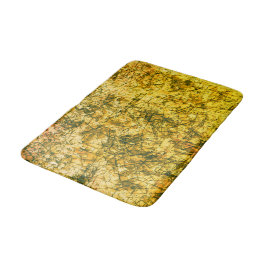 Kratzer auf einem leicht gepunkteten Ocher Badematte