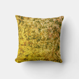 Kratzer auf einem leicht gepunkteten Ocher Kissen