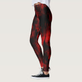 Kratzer-Flecken in hellrot und schwarz Leggings (Links)