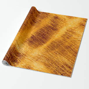 Kratzt auf metallischem goldenen Hintergrund. abst Geschenkpapier