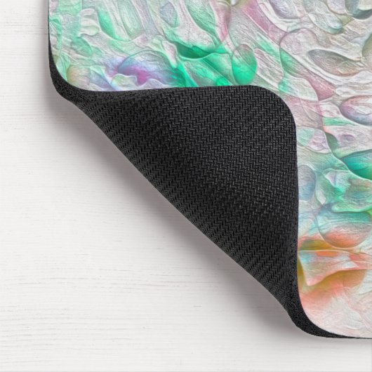 Kratzte Pixel in farbiger Textur über weißlich Mousepad (Ecke)