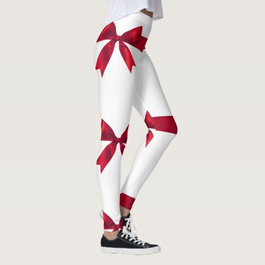 **KRAWATTE A "RED RIBBONS" AUF IHREM GAL** LEGGINGS (Rechts)