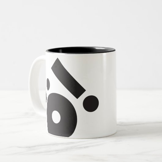 KREATIONEN TYP-(Ö!) ZWEIFARBIGE TASSE (Vorderseite Links)