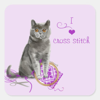 Kreative Katze mit Stickereihupf Quadratischer Aufkleber