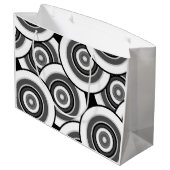 Kreise und Ringe geometrische schwarz-weiße Patter Große Geschenktüte (Rückseite Schrägansicht)