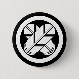 Kreuzfedern im Kreis Button